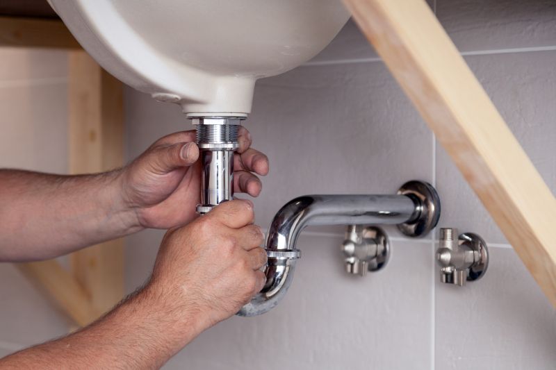 Plumber Installing a Fixture